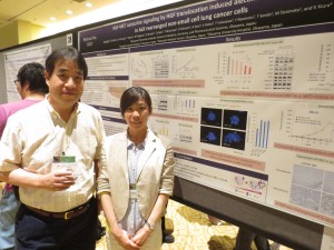 Tenth AACR-JCA joint conference in Maui (間野博行先生と磯崎英子先生)